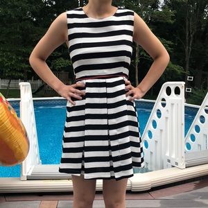 Striped white and black dress with red belt